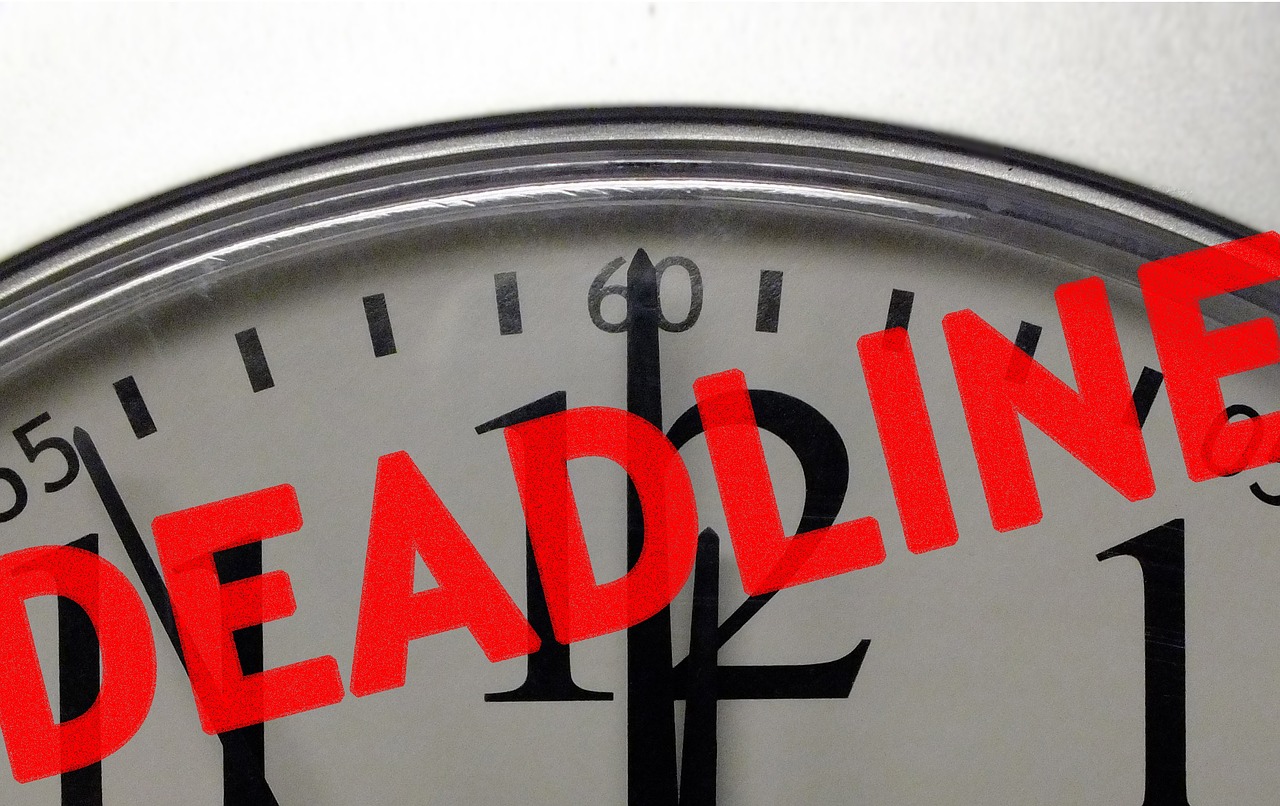 Clock overprinted with the word deadline