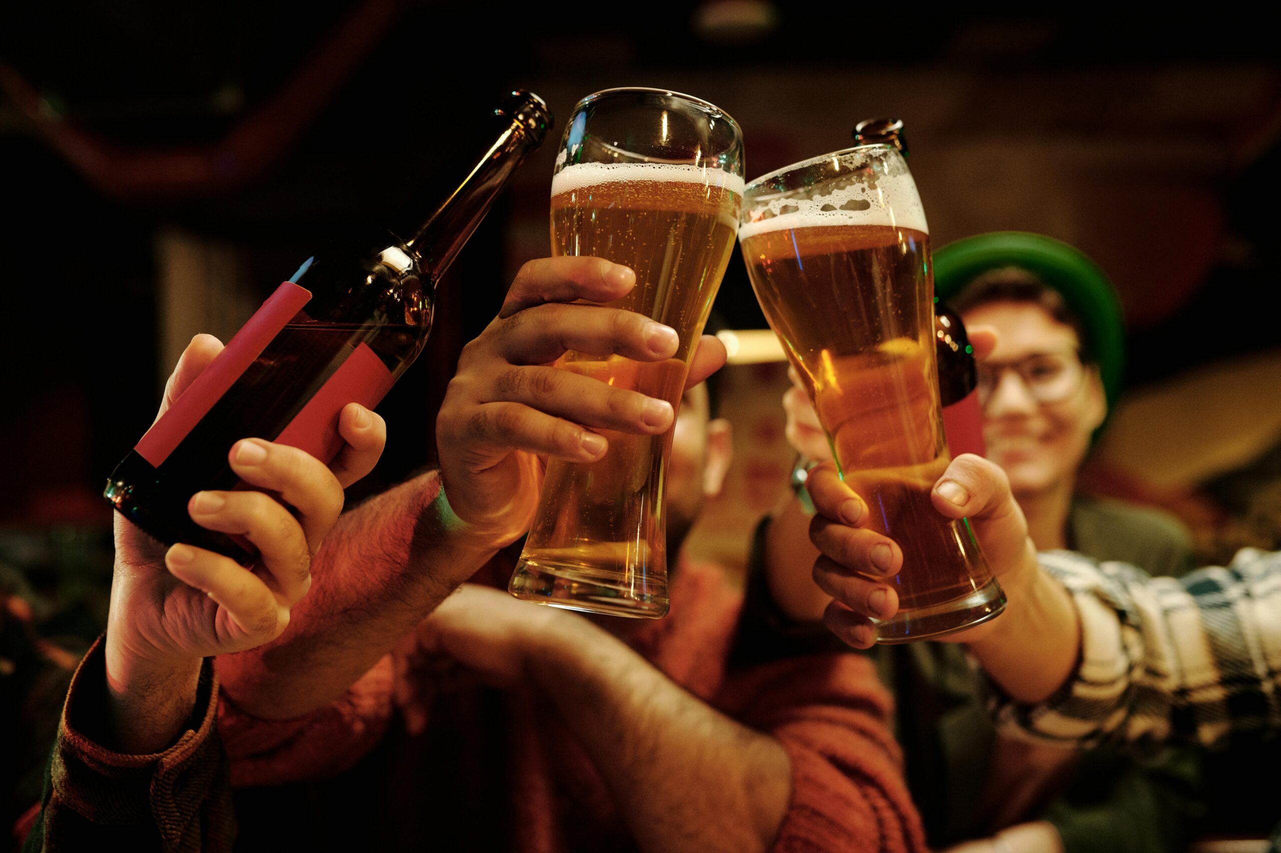 People in a pub with drinks