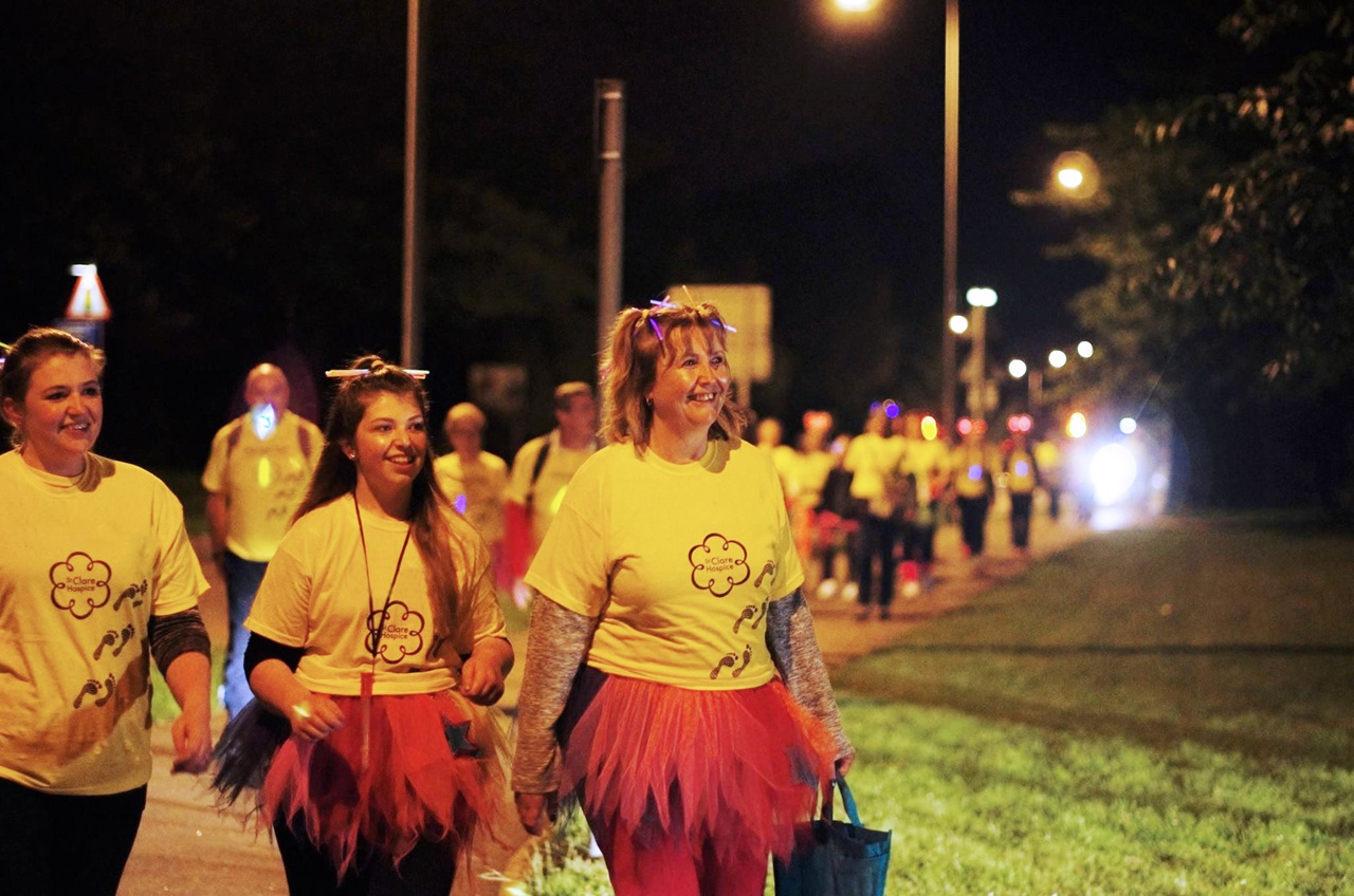 Group of women taking part in a night walk.